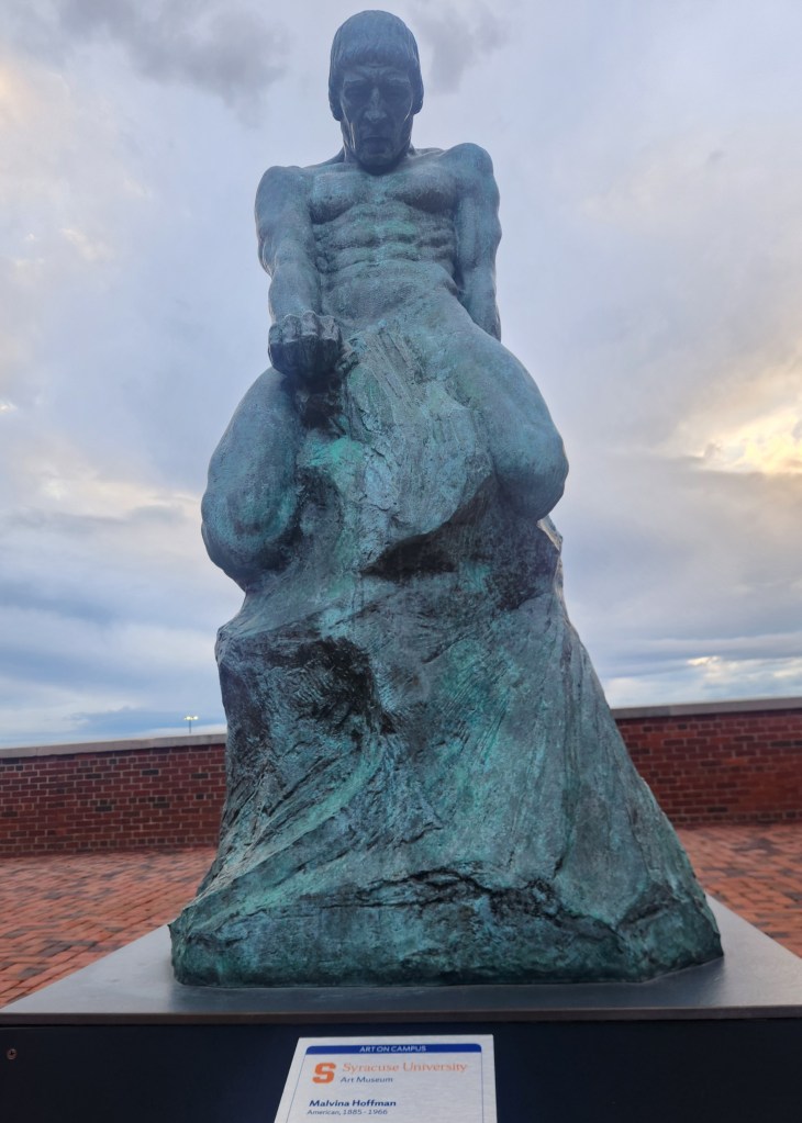 A statue of a man at Syracuse University.